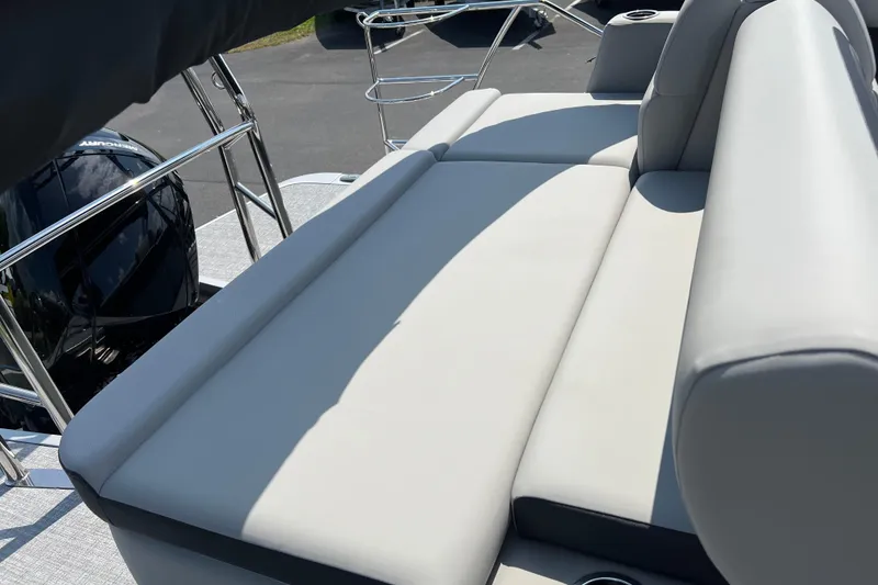 Slide: The Image of 2025 Harris Cruiser 230 boat with sleek seating and modern design. - 21