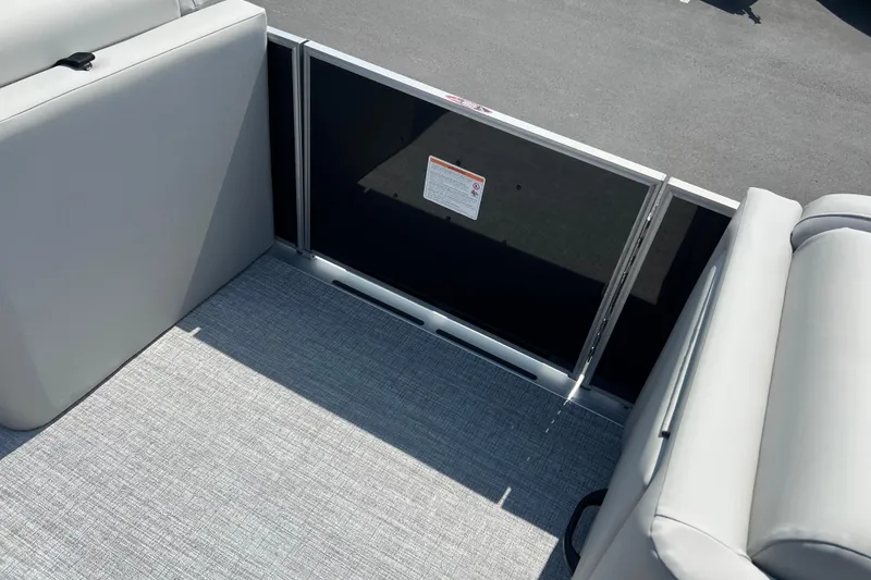 Slide: The Image of Interior view of 2025 Harris Cruiser 230 boat with gray seating and flooring. - 24