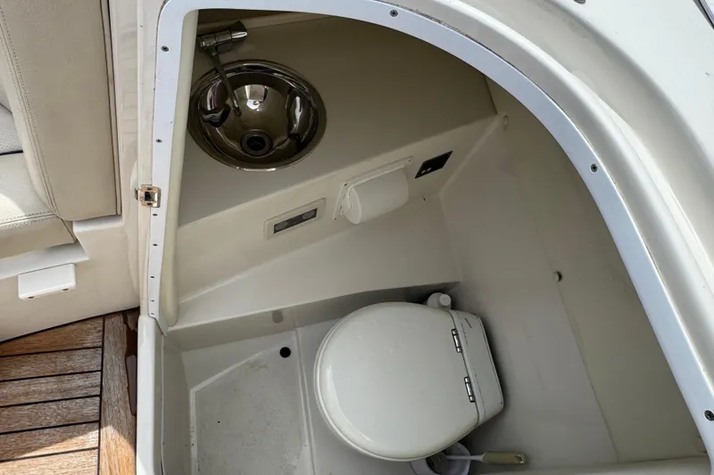 Slide: The Image of 2007 Chris-Craft Launch 28 boat interior with sink and toilet. - 13