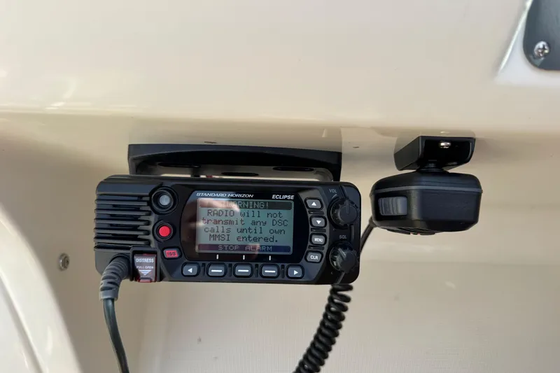 Slide: The Image of Marine radio on 2007 Chris-Craft Launch 28, displaying warning message about MMSI entry. - 21