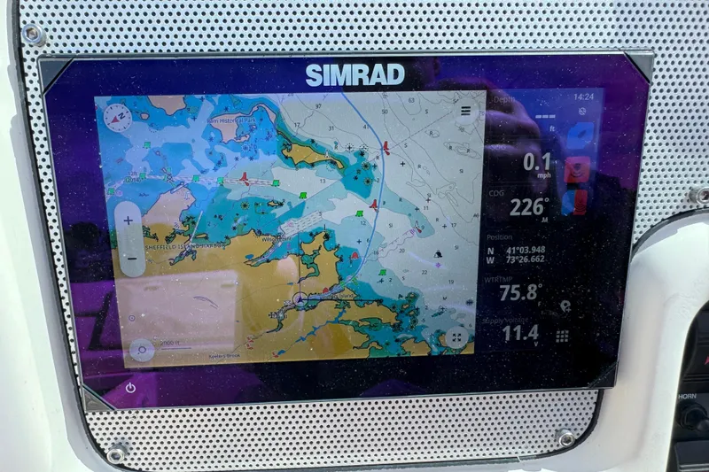Slide: The Image of Simrad navigation display on 2007 Chris-Craft Launch 28 boat, showing nautical map and data. - 22