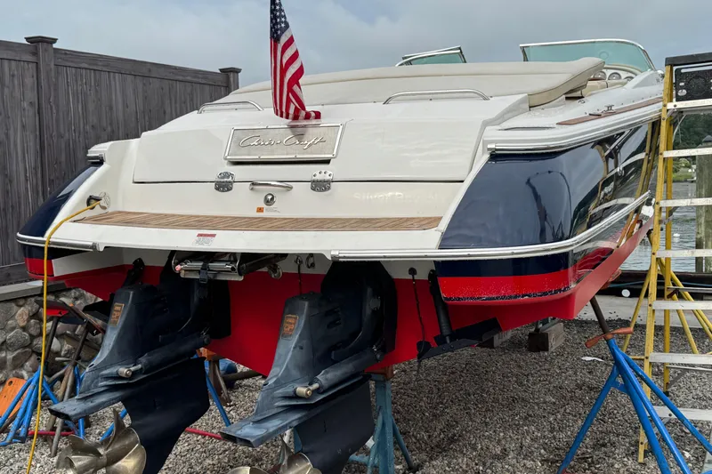 Slide: The Image of 2007 Chris-Craft Launch 28 boat on dry dock with American flag. - 4