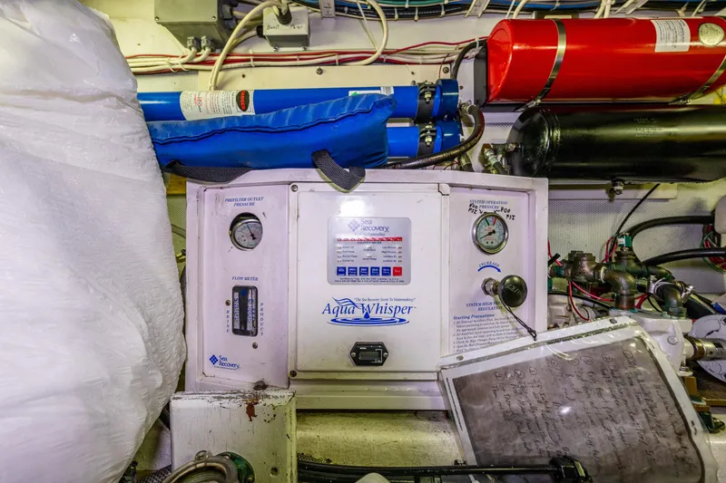 Slide: The Image of Engine room of 1978 Hidden Harbor Custom Trawler with Aqua Whisper watermaker system. - 42