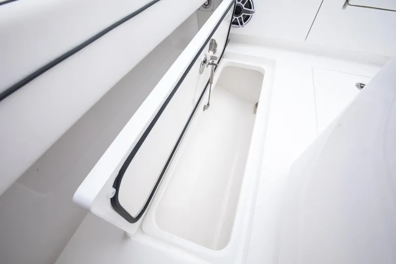 Slide: The Image of 2026 Valhalla Boatworks V-29 Hybrid storage compartment, open and empty, showcasing sleek design. - 12