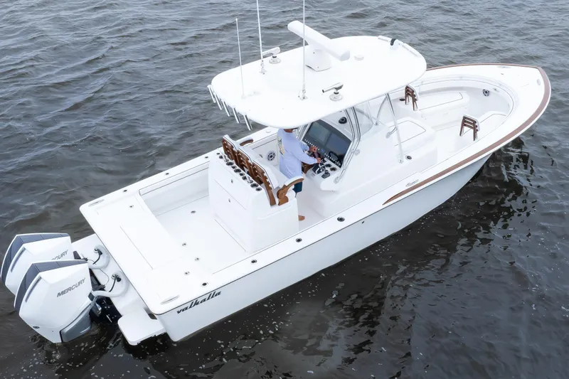 Slide: The Image of 2026 Valhalla Boatworks V-29 Hybrid on water, featuring dual Mercury engines. - 2