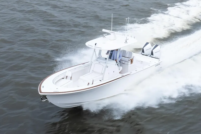 Slide: The Image of 2026 Valhalla Boatworks V-29 Hybrid cruising on open water, showcasing sleek design and performance. - 3