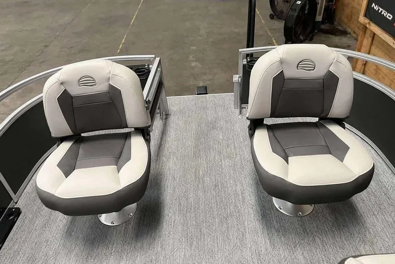 Slide: The Image of 2026 Sun Tracker Bass Buggy® 16 XL Select boat seats, gray and white upholstery. - 6