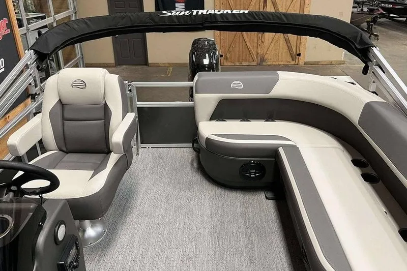 Slide: The Image of 2026 Sun Tracker Bass Buggy® 16 XL Select interior with plush seating and modern design. - 7