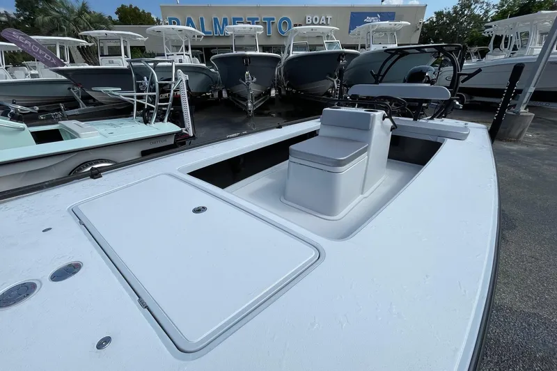 Slide: The Image of 2026 Chittum Skiffs Islamorada 21 boat with trolling motor and elevated platform. - 10