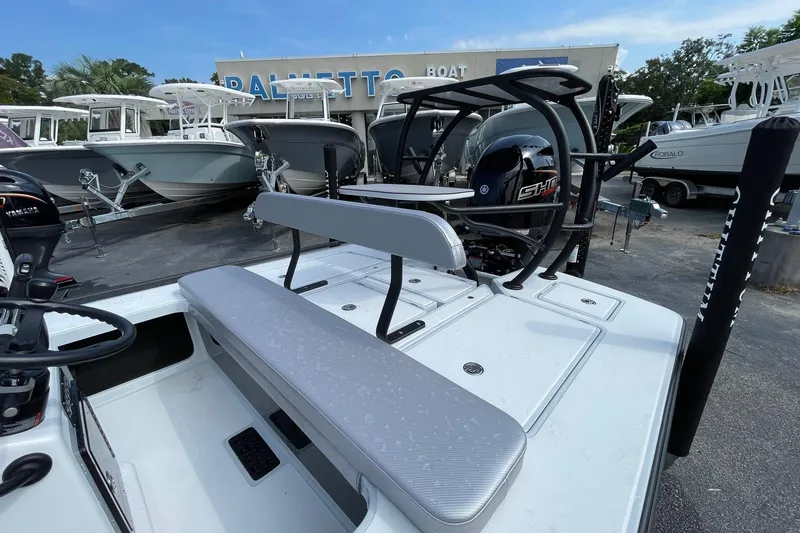 Slide: The Image of 2026 Chittum Skiffs Islamorada 21 boat console with steering wheel and controls. - 16