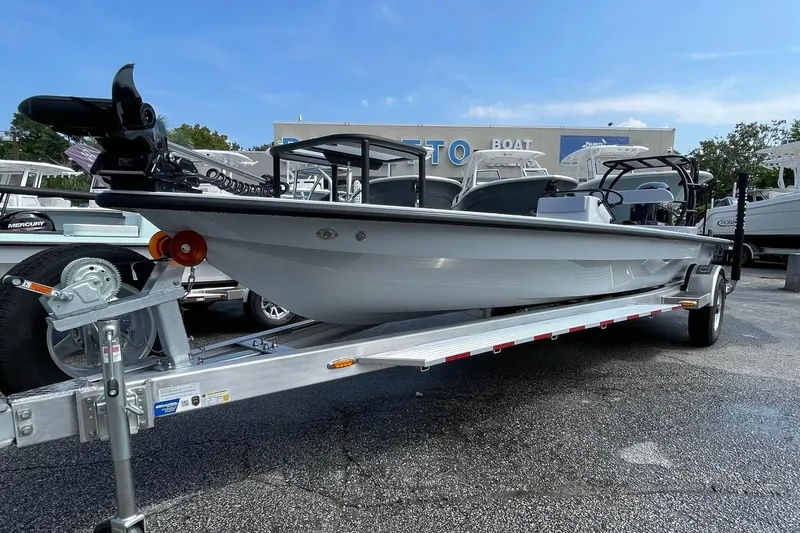 Slide: The Image of 2026 Chittum Skiffs Islamorada 21 boat on trailer, displayed outdoors with Yamaha engine. - 3