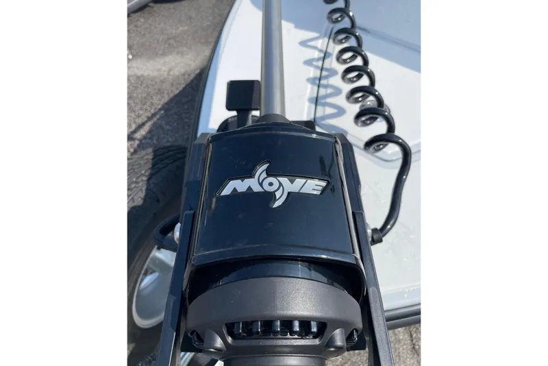 Slide: The Image of 2026 Chittum Skiffs Islamorada 21 boat on trailer, featuring a trolling motor. - 31