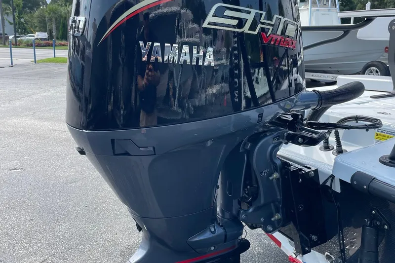 Slide: The Image of 2026 Chittum Skiffs Islamorada 21 hull identification number plate on carbon fiber surface. - 47