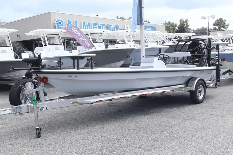 Slide: The Image of 2026 Chittum Skiffs Islamorada 21 boat with Yamaha engine on trailer, outdoor display. - 5