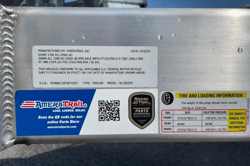 Slide: The Image of 2026 Chittum Skiffs Islamorada 21 boat on trailer, showcasing sleek hull design. - 52