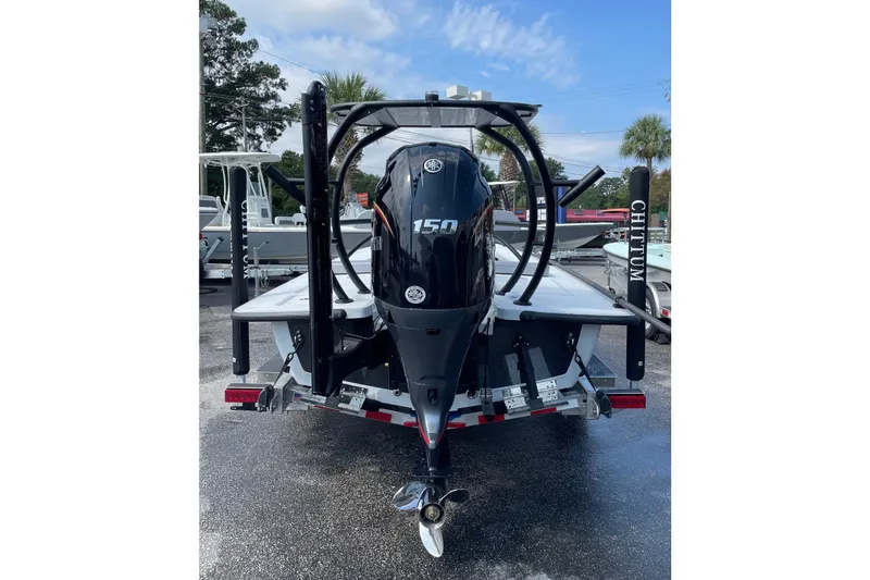 Slide: The Image of 2026 Chittum Skiffs Islamorada 21 boat on trailer at dealership. - 6