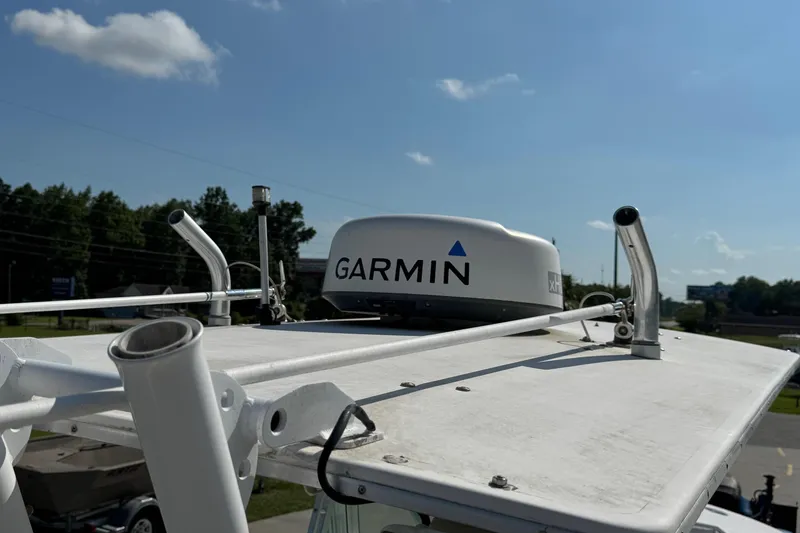 Slide: The Image of 2000 Regulator 26 Center Console with Garmin radar on top. - 23