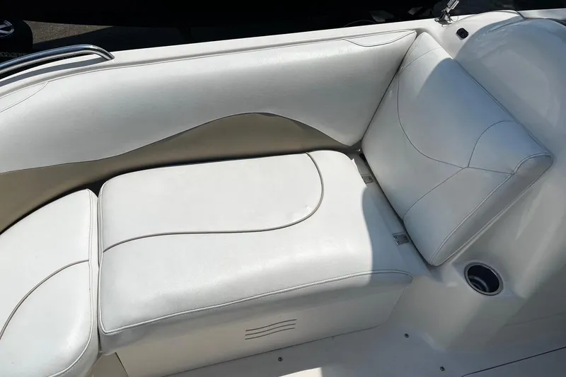 Slide: The Image of White leather seating on a 2008 Hurricane FD202 boat, featuring sleek design and comfort. - 11