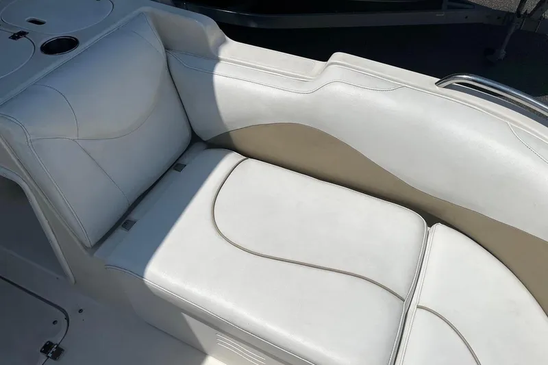 Slide: The Image of White leather seating on a 2008 Hurricane FD202 boat. - 12