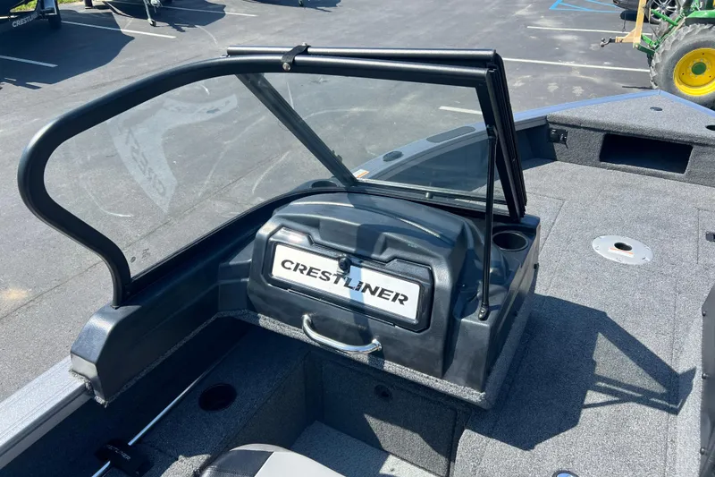 Slide: The Image of 2024 Crestliner 1850 Fish Hawk boat interior with windshield and dashboard. - 9