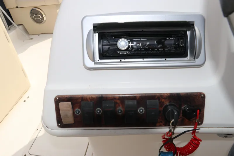 Slide: The Image of Control panel of a 2014 Hurricane FunDeck 226 boat with Sony stereo system. - 17
