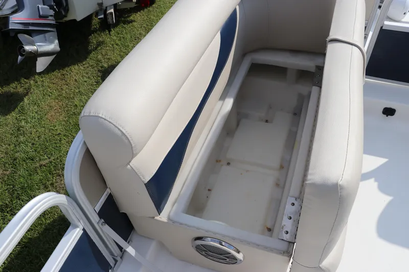 Slide: The Image of 2014 Hurricane FunDeck 226 boat seat with open storage compartment. - 32