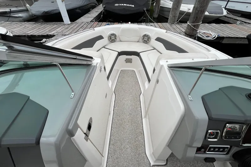 Slide: The Image of 2013 Chaparral 226 SSi Wide Tech boat interior with seating and dashboard view. - 16