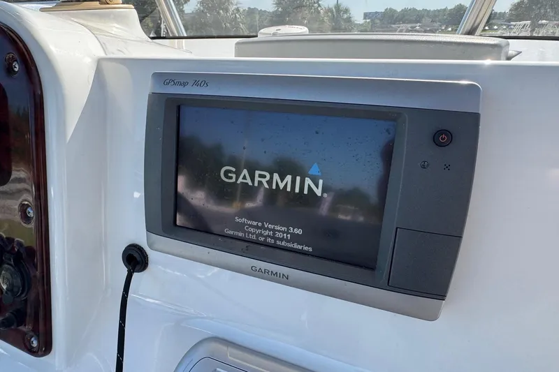 Slide: The Image of Garmin GPSmap 740s on 2012 Sea Hunt Triton 225 boat dashboard. - 14
