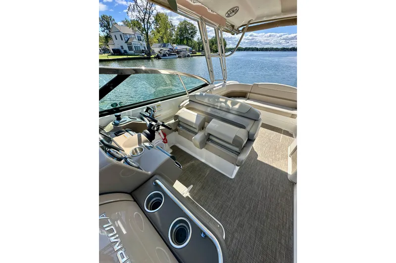 Slide: The Image of 2015 Formula 350 Crossover Bowrider I/O interior with luxurious seating and lake view. - 14