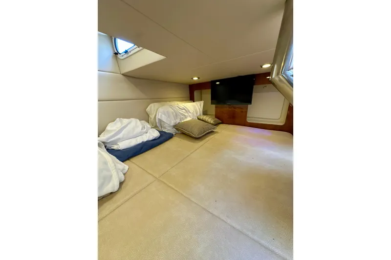 Slide: The Image of Interior cabin of 2015 Formula 350 Crossover Bowrider I/O with cozy bedding and TV. - 20