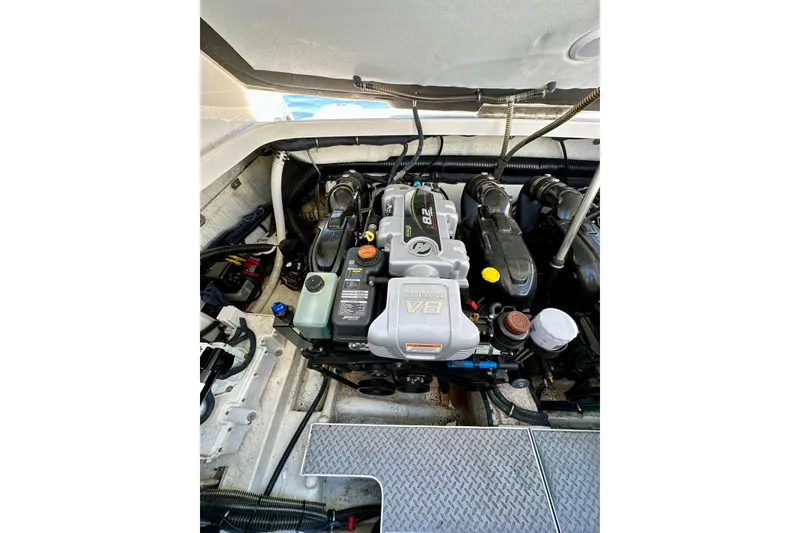 Slide: The Image of 2015 Formula 350 Crossover Bowrider I/O engine compartment, featuring a powerful V8 engine. - 29