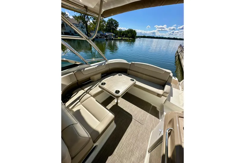 Slide: The Image of 2015 Formula 350 Crossover Bowrider I/O interior with lake view, featuring comfortable seating. - 6