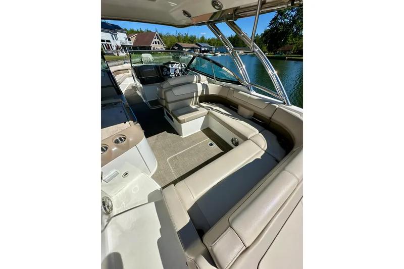 Slide: The Image of 2015 Formula 350 Crossover Bowrider I/O interior with luxurious seating and sleek design. - 7