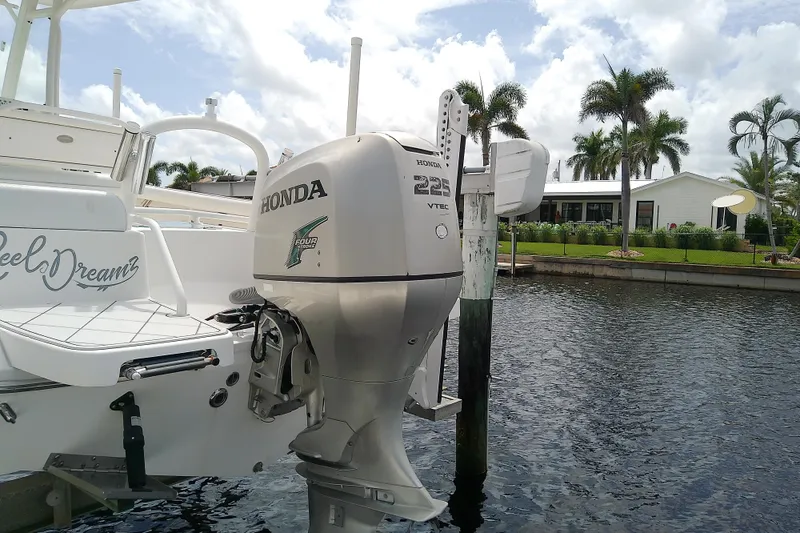 Slide: The Image of 2008 Everglades 210 Center Console with Honda 225 VTEC engine docked by waterfront. - 10