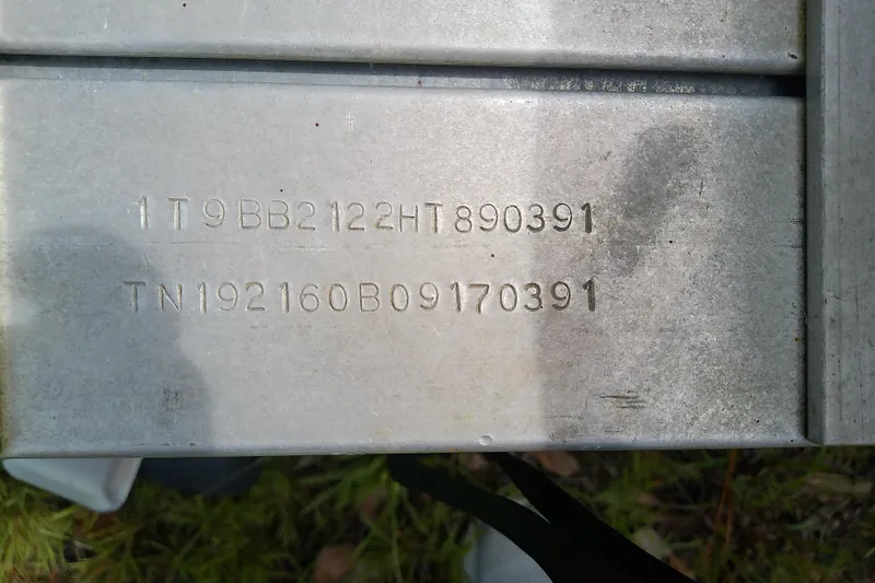 Slide: The Image of VIN and serial numbers on a 2008 Everglades 210CC boat hull. - 58