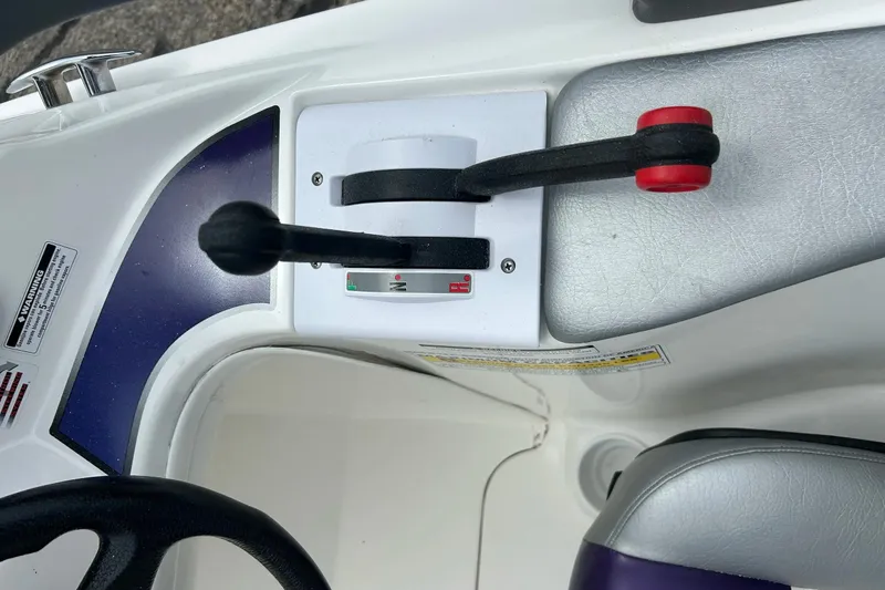 Slide: The Image of Sea Doo 2000 boat capacity label, 8 persons or 653 kg, U.S. Coast Guard compliant. - 12