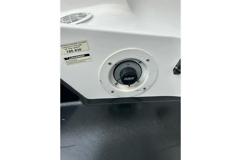 Slide: The Image of Open storage compartment of a 2003 Sea Doo 2000 watercraft, showcasing interior details. - 17