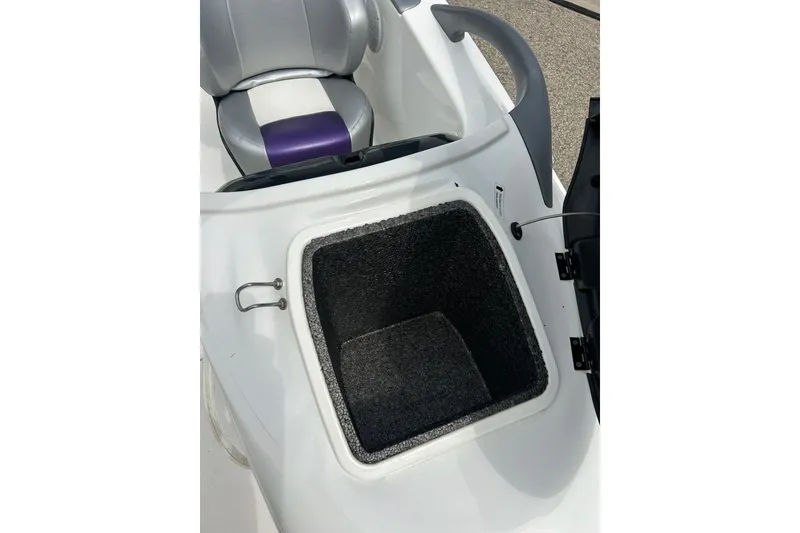 Slide: The Image of Sea Doo 2000 jet ski storage compartment, open view, 2003 model. - 19