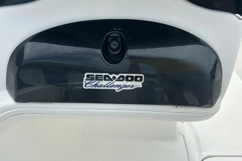 Slide: The Image of Sea Doo Challenger 2000 boat dashboard, 2003 model, black and white design. - 20