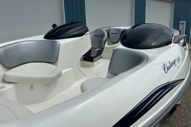 Slide: The Image of 2003 Sea Doo Challenger 2000 boat with sleek design and comfortable seating. - 32