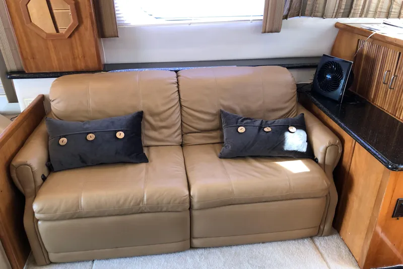 Slide: The Image of Beige leather sofa with buttoned cushions in 2001 Carver 374 Voyager interior. - 20