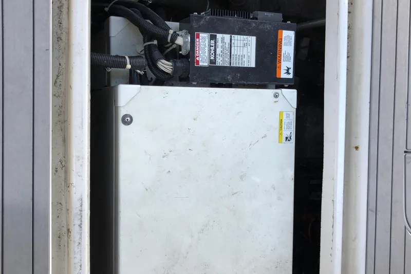 Slide: The Image of Engine compartment of a 2001 Carver 374 Voyager with visible Kohler generator. - 29