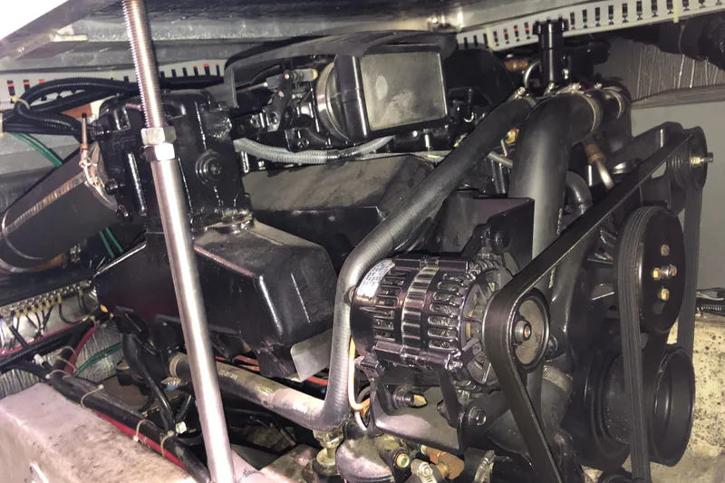 Slide: The Image of Engine compartment of a 2001 Carver 374 Voyager boat, showcasing mechanical components. - 31