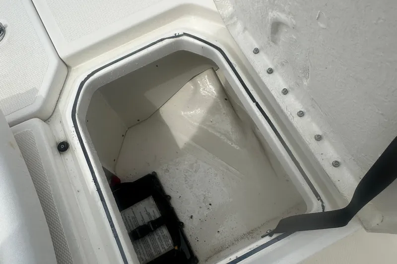 Slide: The Image of Open storage compartment in 2022 Trophy T-18 boat, showing interior details. - 20