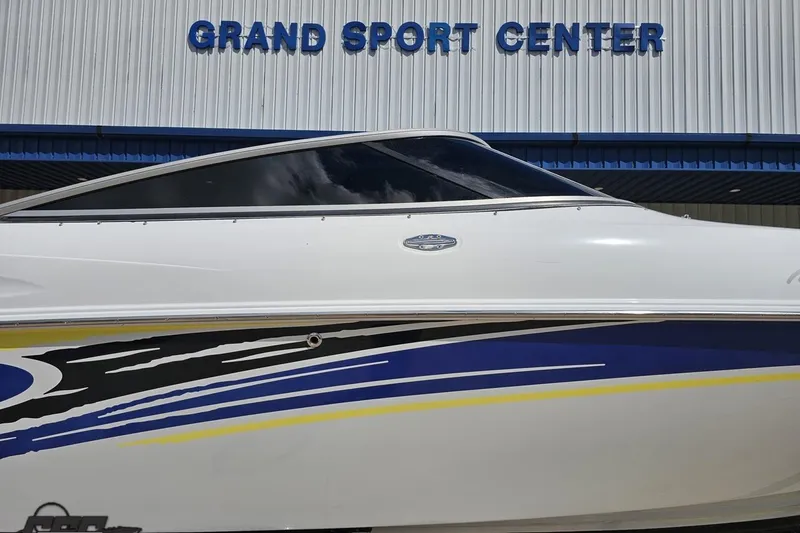 Slide: The Image of 2005 Baja 275 boat with sleek design at Grand Sport Center. - 3