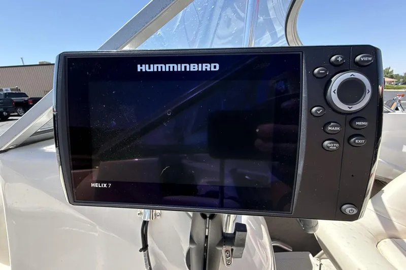 Slide: The Image of Humminbird Helix 7 fish finder on 2008 Tahoe Q5i SF boat dashboard. - 21