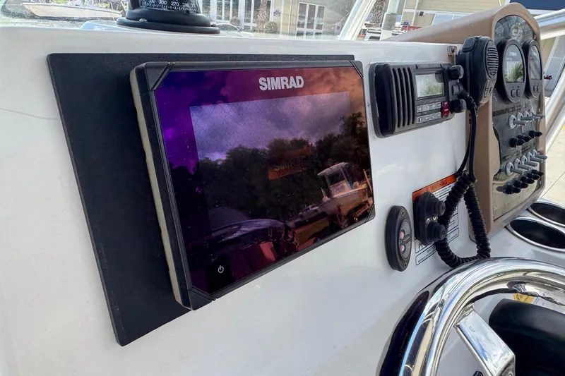 Slide: The Image of Control panel of a 2015 Sea Fox 220 Viper boat with Simrad display. - 10