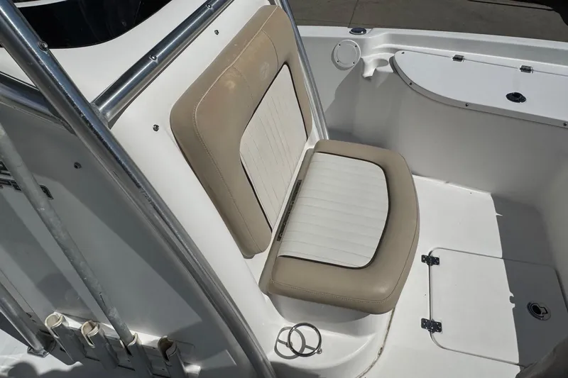 Slide: The Image of 2015 Sea Fox 220 Viper boat seat with beige and white upholstery. - 15