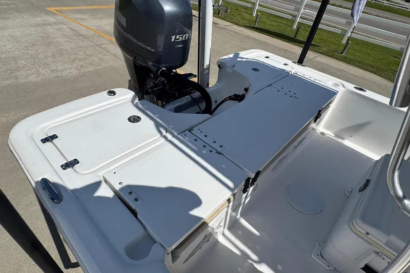 Slide: The Image of 2015 Sea Fox 220 Viper boat with Yamaha 150 engine, docked on concrete. - 19