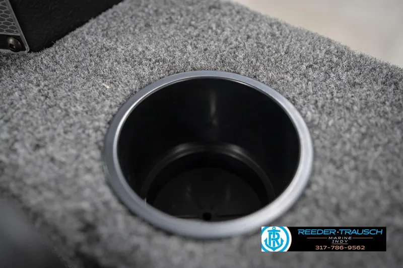 Slide: The Image of Cup holder on 2026 Lund 1650 Rebel XL Sport boat with carpeted surface. - 39